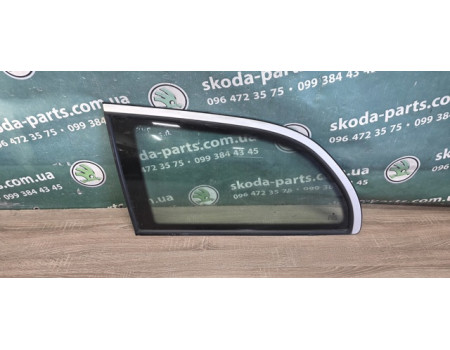 Скло кузова заднє ліве глухе Skoda Octavia Tour універсал VAG (1U9845297A)