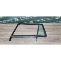 Скло з ущільненням задніх лівих дверей Skoda Octavia A5 комбі VAG (1Z9845209H)