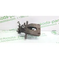 Супорт гальмівний задній лівий Skoda Octavia A7 універсал 1.6 TDI VAG (5Q0615423A)
