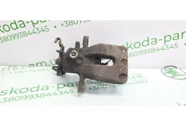 Супорт гальмівний задній лівий Skoda Octavia A7 універсал 1.6 TDI VAG (5Q0615423A)