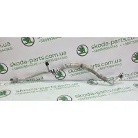 Трубка кондиціонера Skoda Fabia II 1.4 бензин VAG (6Q0820721AF) Трубка кондиціонера Skoda Fabia II 1.4 бензин VAG (6Q0820721AF)