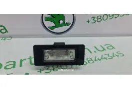 Підсвітка номера комбі Skoda Fabia New 8T0943021 VAG (8T0943021)